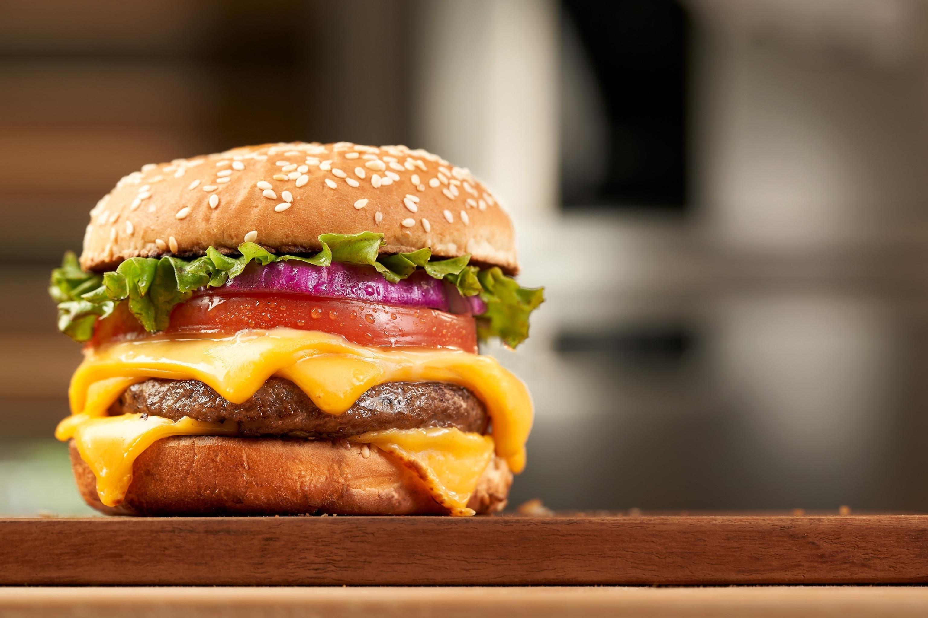PHOTO: double cheese beef burger with kitchen background