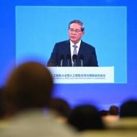 China urges global consensus on balancing AI development, security | National