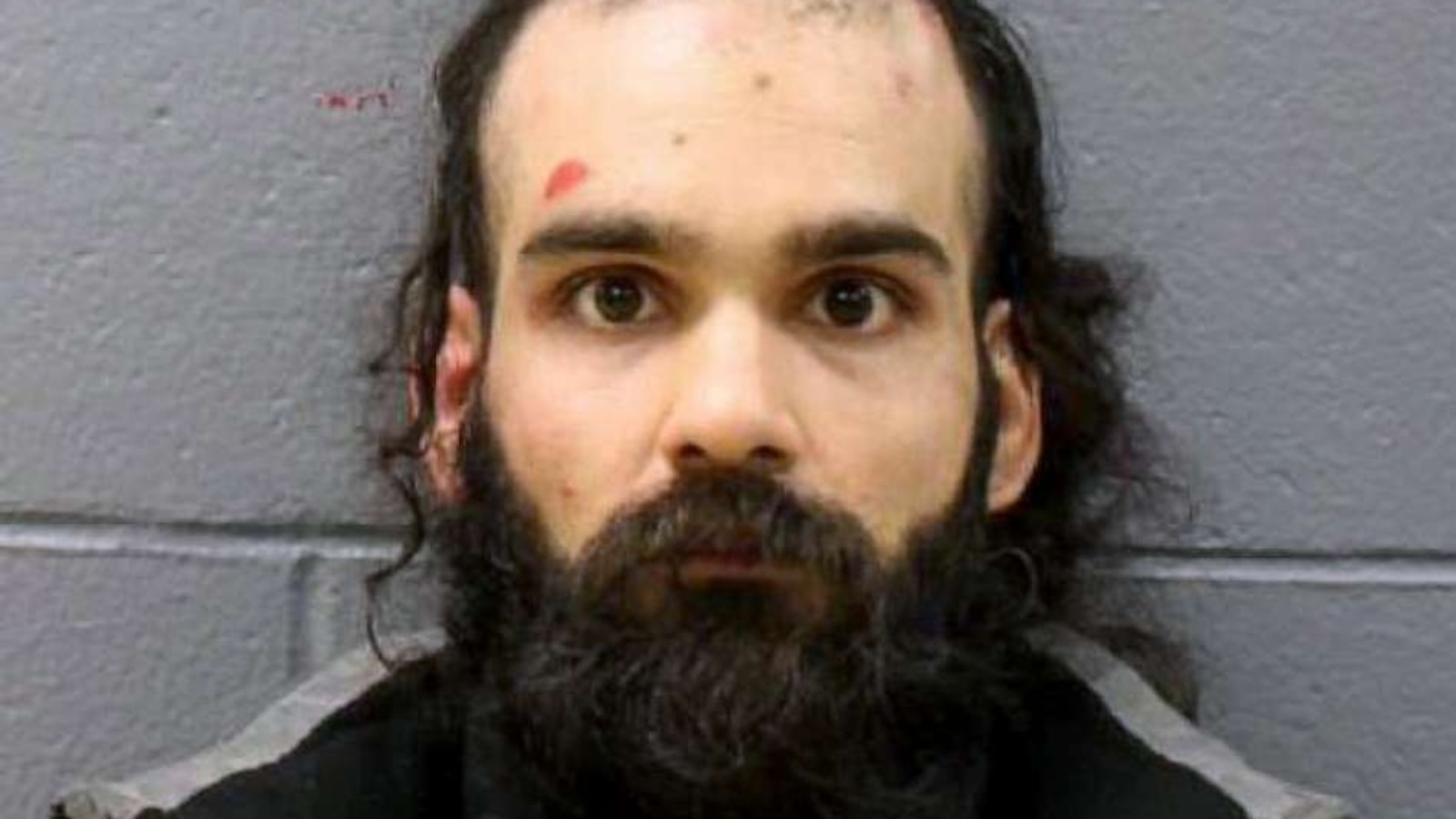 Man sentenced to time served for trying to open plane door, stab flight attendant in neck