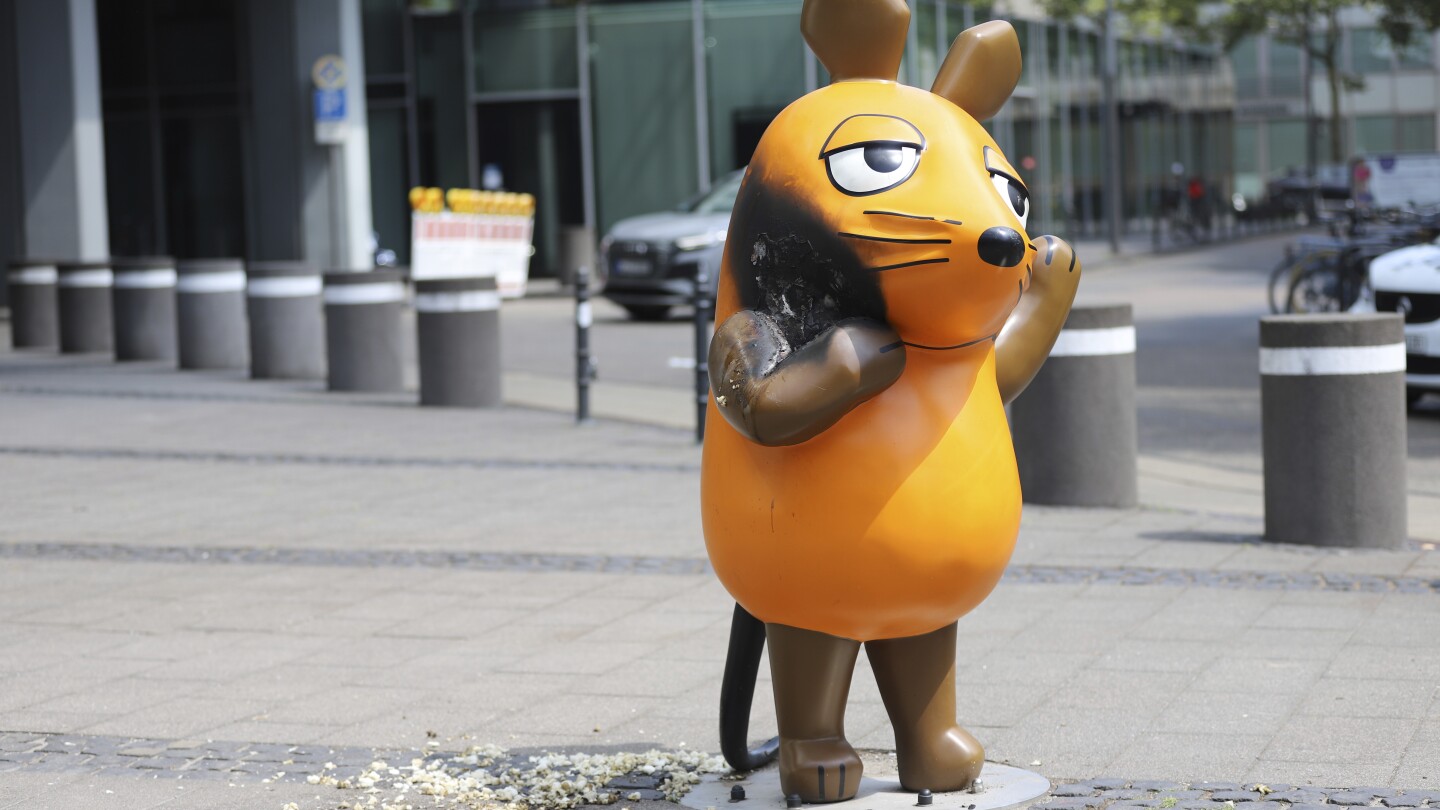 Vandals set fire to a mouse statue that’s a TV star and mascot for a German broadcaster